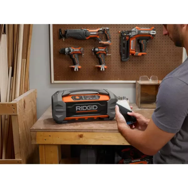 RIDGID 18-Volt Cordless Hybrid Jobsite Radio with Bluetooth Wireless Technology with 1.5 Ah Lithium-Ion Battery